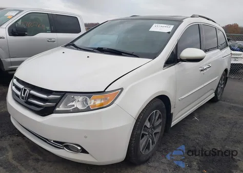 2014 Honda Odyssey Touring/Touring Elite from USA, damaged, VIN 5FNRL5H94EB084010